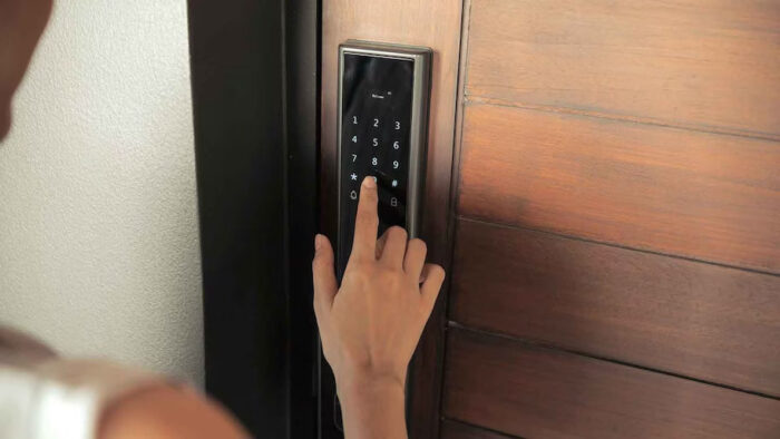 How do I change the code on my smart door lock